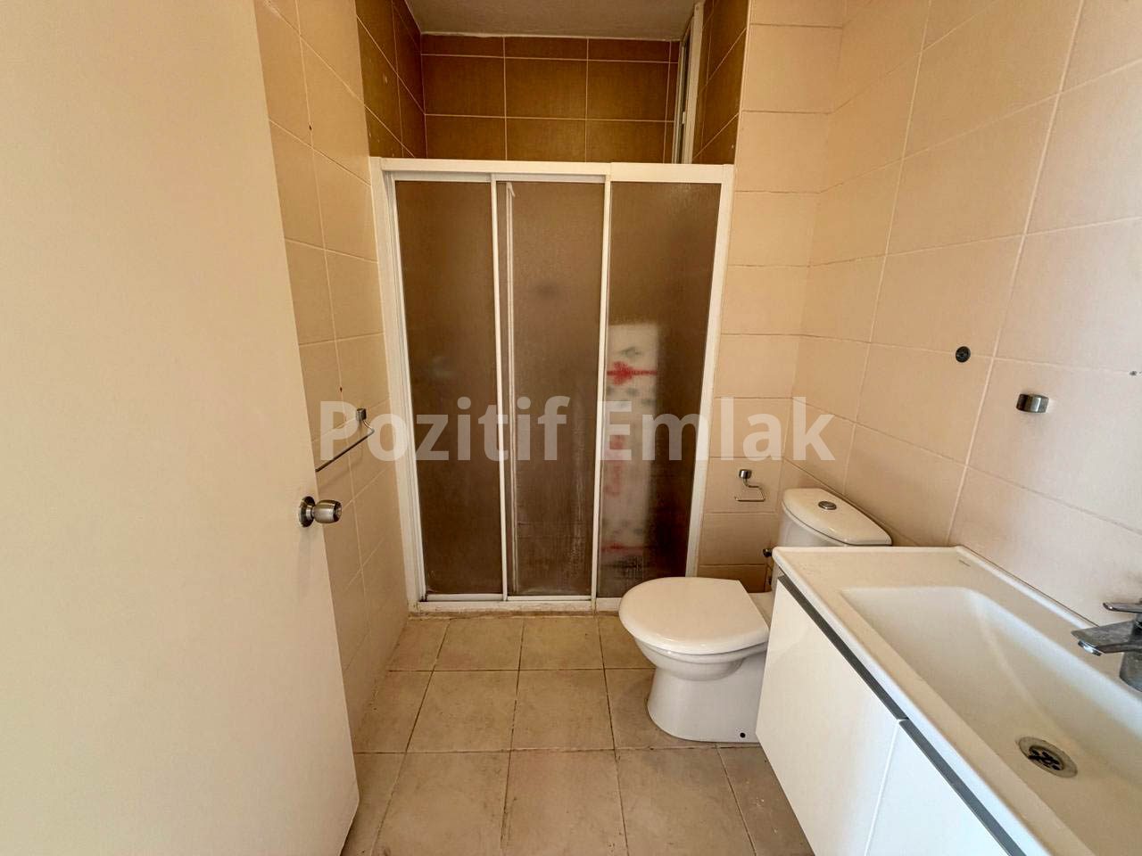 Turgutreis Yalı'da Denize Sıfır Havuzlu Sitede Bahçe Katı Daire